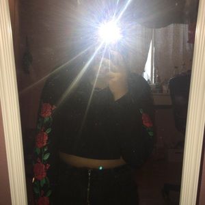 Black crop top with roses on sleeves